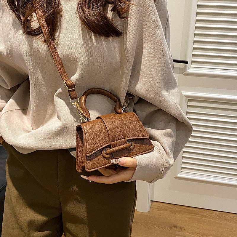 Mini flap bag flap-over closure detail