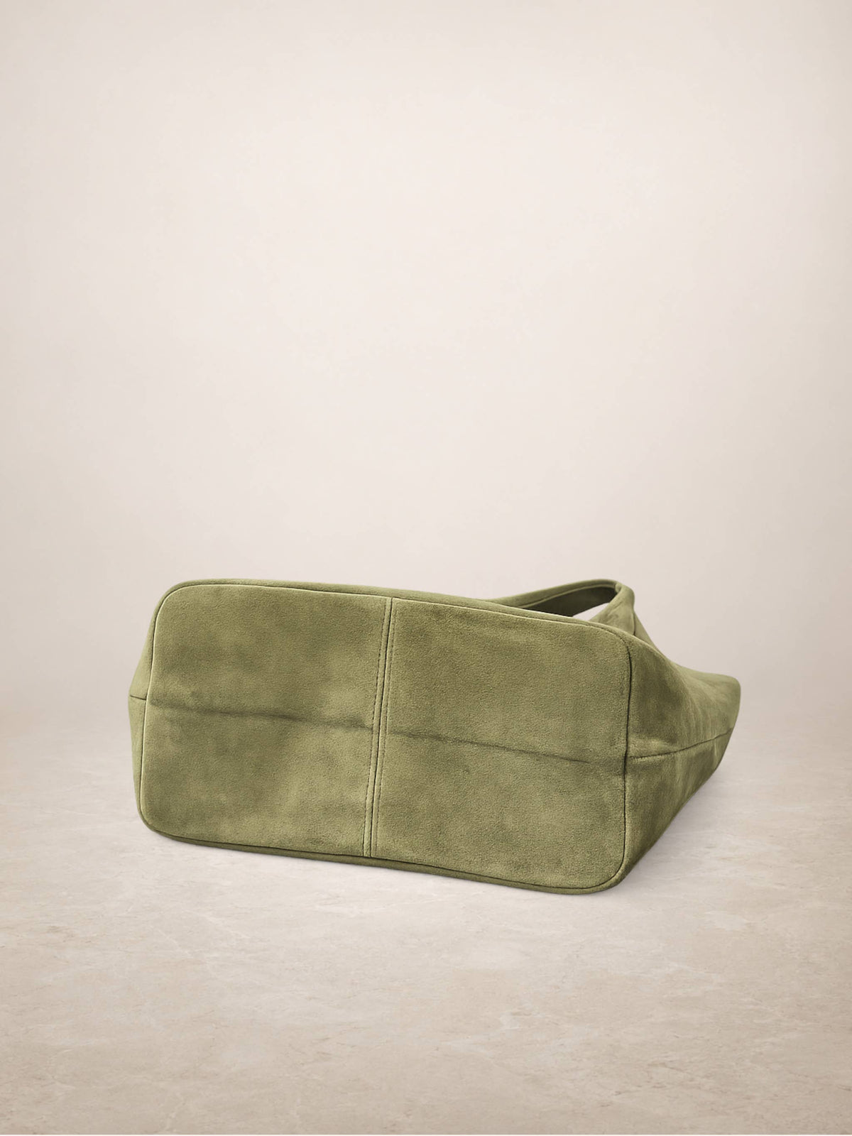 Giannina suede tote carried on the shoulder
